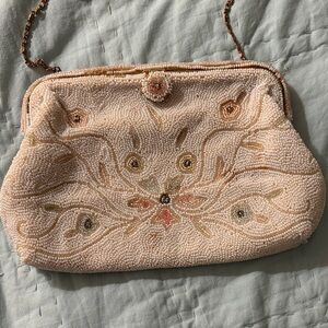 Elegant Beaded Ivory Clutch